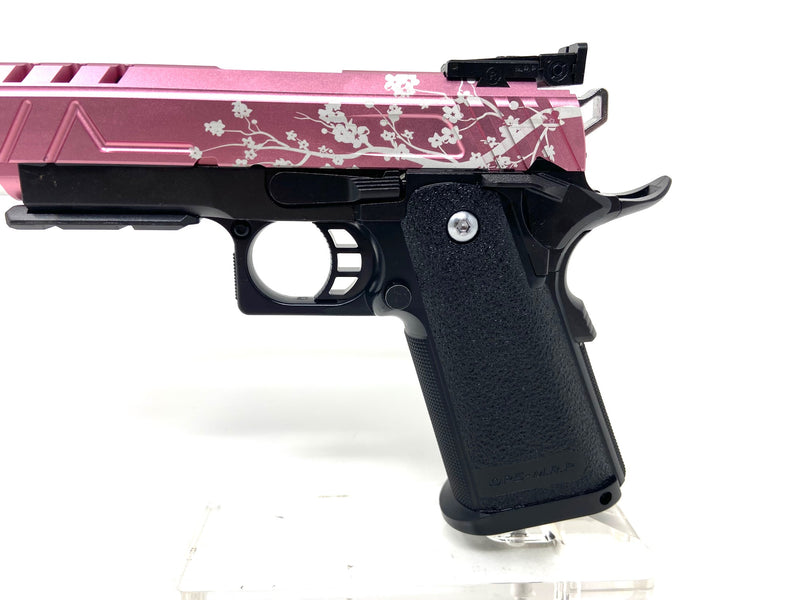 Cherry Blossom Includes:  Tokyo Marui 5.1 base  Cherry Blossom Engraved Airsoft Masterpiece Diva Slide  AIP 140% Recoil Spring  AIP 140% Nozzle Spring  AIP steel Threaded outer barrel  CowCow buffer kit   